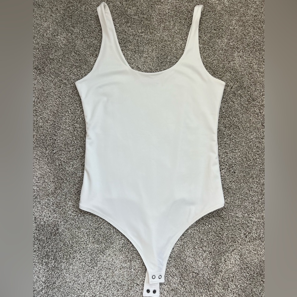 Women’s Abercrombie Small white body suit (soft collection)